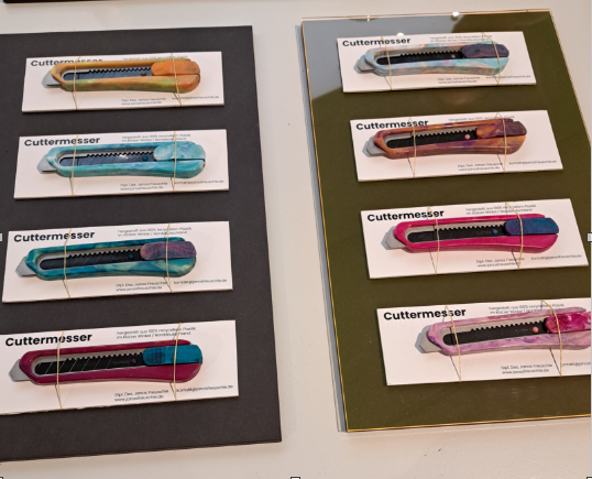 Janos Freuschle präsentiert handgefertigte Cuttermesser mit farbifer, marmorierter Oberfläche aus recyceltem Kunststoff auf der GRASSIMESSE 2026.